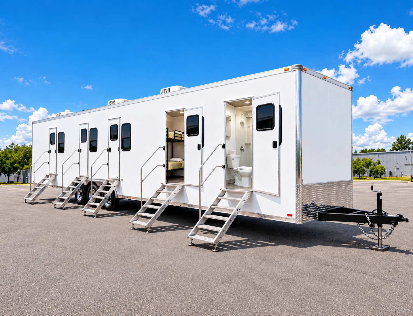 Example multi-purpose trailer with sleeping and restroom spaces
