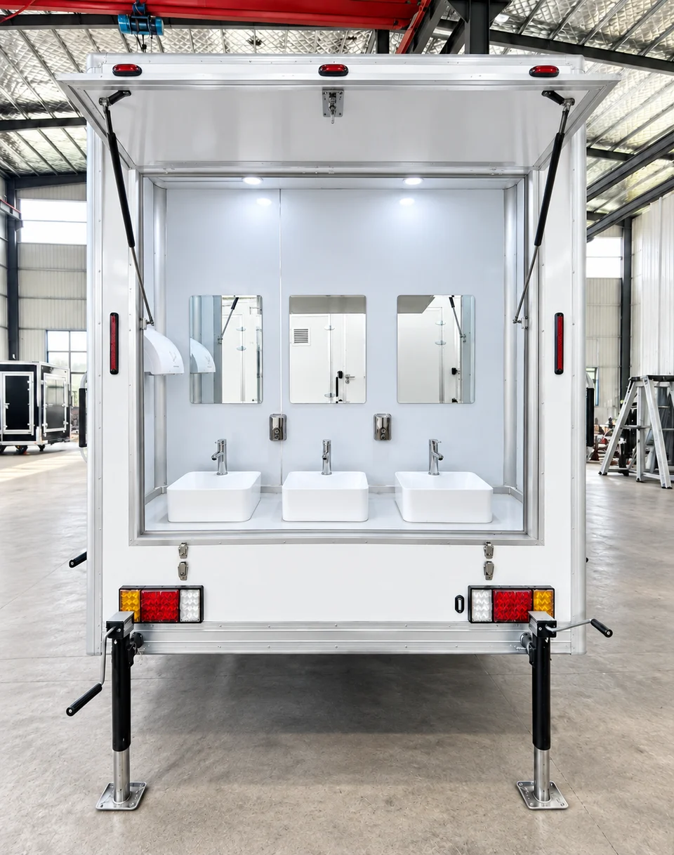 External handwashing sinks at the rear of the shower trailer