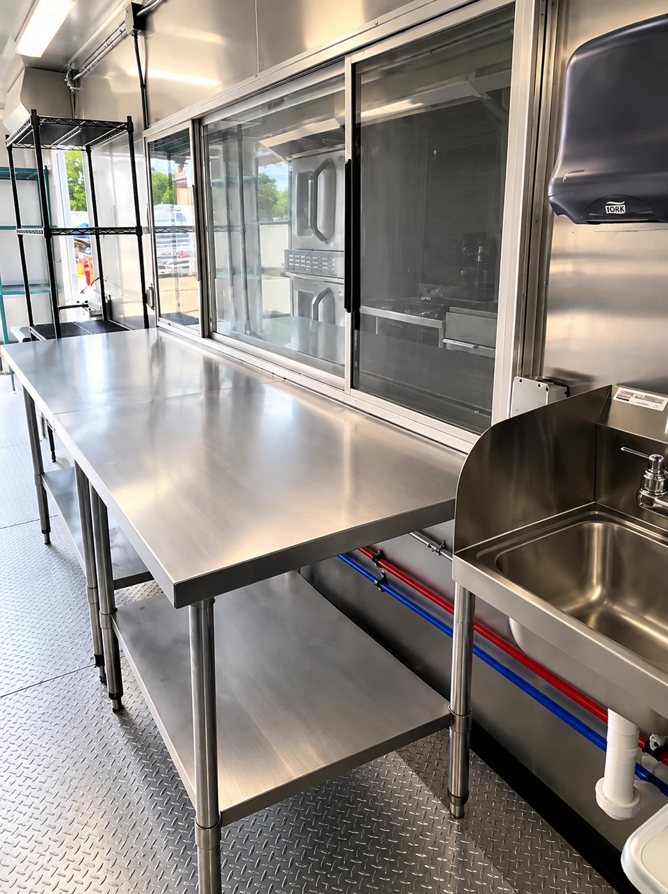 Stainless preparation table inside the mobile kitchen